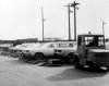 Jitney driver loads his own trailers with cars that did not require repairs in plant 8. Cars tha.jpg